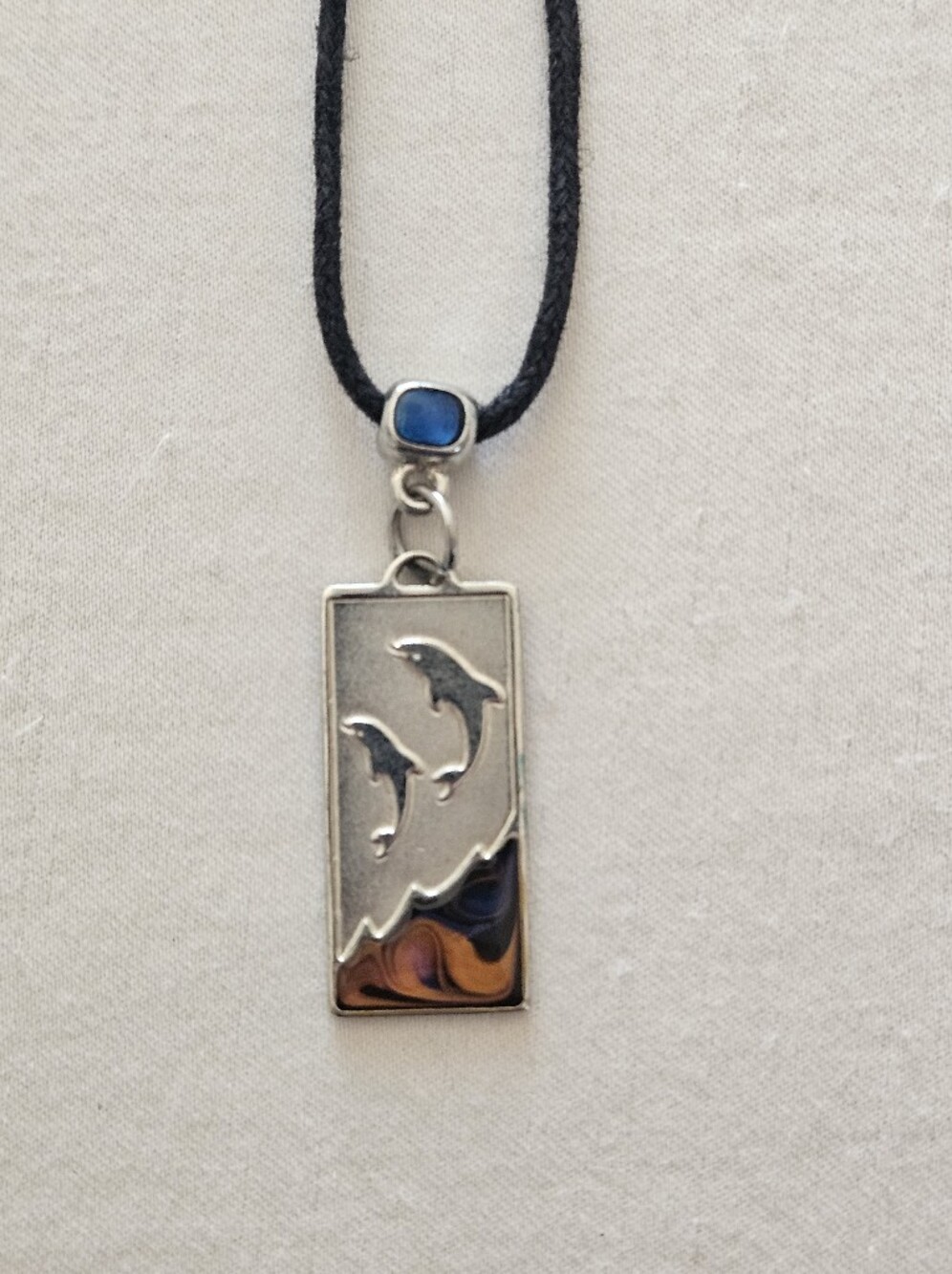 Silver Dolphin Pendant Necklace with Blue Stone Accent Unisex